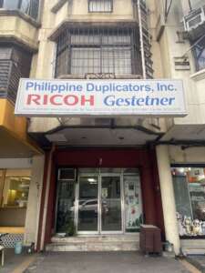 Exterior view of the Quezon City branch of Philippine Duplicators, Inc., known for supplying top-quality photocopiers and office equipment